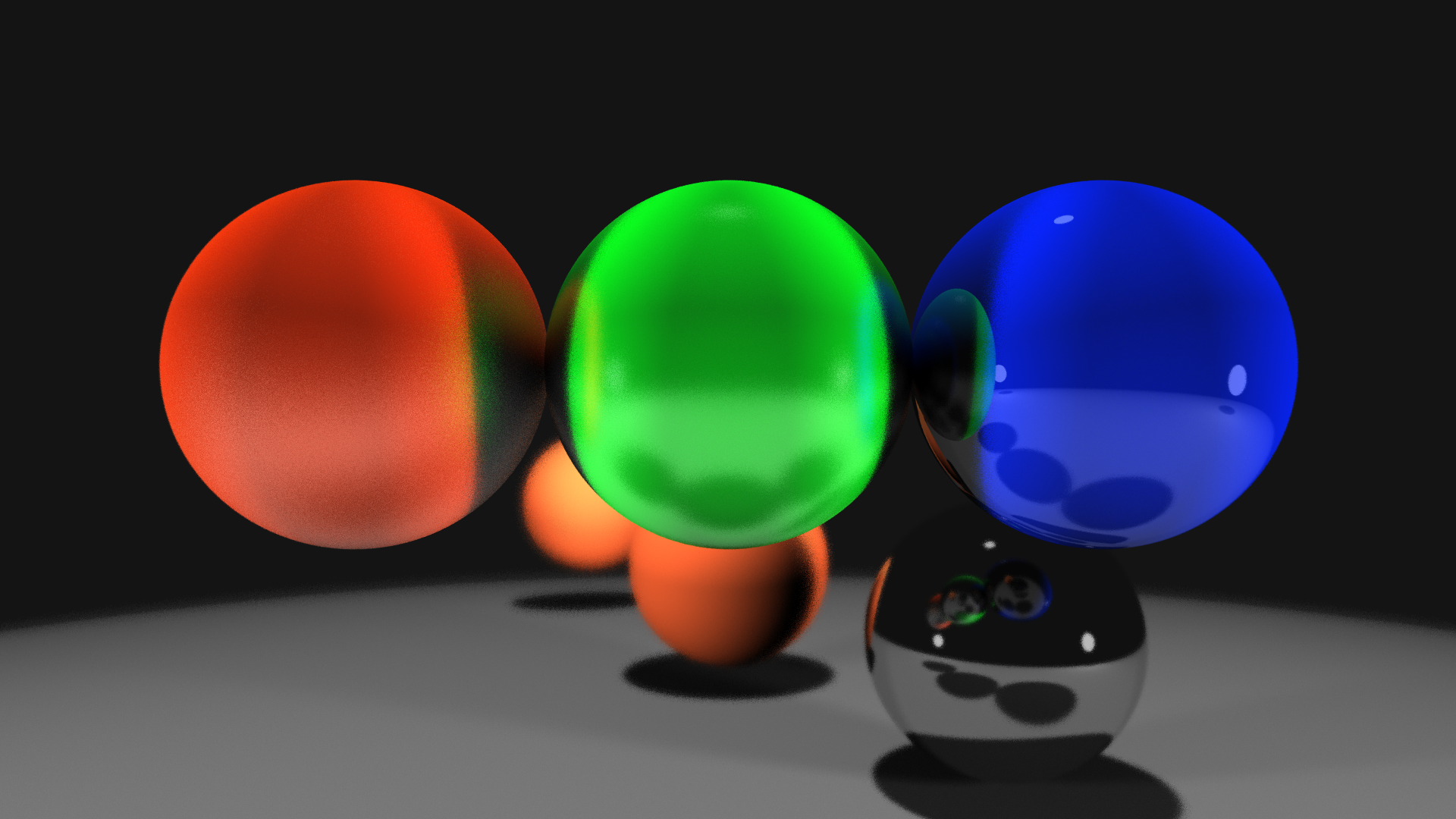 Raytraced result showing three spheres with focal depth